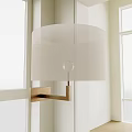 Modern Wall Lamp With White Semi-transparent Lampshade And Brass Arm Mounted On Wall