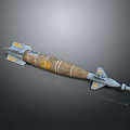 Military Bomb With Brown Body Yellow Markings Blue Stabilizer Fins And Gray Nose Cone