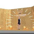 YY2021 Annual Ceremony Scene With Golden Tassel Backdrop Woman In Black Dress And Decorative Balls