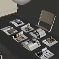Arranged Open And Rolled Up Magazines On Dark Modern Table With Chair