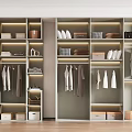 Modern Wardrobe Interior Design With Brass Handles Open Shelf Decorative Items And Folded Clothes