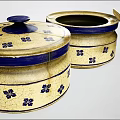 Yellow Ceramic Container With Blue Flower Patterns And Lid Handle For Household Use 3d model