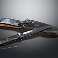 Tactical Metal Blade Knife With Black Stitched Leather Sheath And Textured Handle On Dark Surface