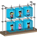 Multiple Dolls in Transparent Display Cases with Metal Frame and Wooden Base