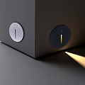 Sleek Modern Device With Two Circular Control Knobs And Illuminated Light Output On Matte Black Surface 3d model