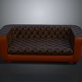 Elegant Classic Brown Leather Sofa With Tufted Design And Orange Armrests