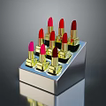 Woman's Lipstick Display With Red Pink Colors On Metal Stand Gold Base