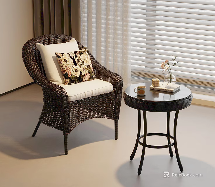 Wicker Leisure Chair with Cushioned Seat Floral Pillow and Side Table in Indoor Setting 3d model 