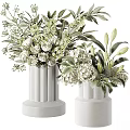 Decorative Ornament Set With White Cylindrical Vases Green Leaves And White Flowers