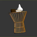 Bamboo Round Side Table With White Conical Vase Brown Mug And Yellow Books