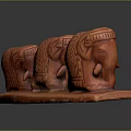 Three Red Hand Carved Elephant Sculptures With Intricate Patterns On Base 3d model