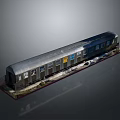Model Train With Silver Carriage Multiple Windows On Gray Base