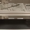 Modern Reception Desk With Marble Surface Black Sculpture Sofa Coffee Table And Decorative Plant