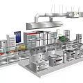 Commercial Kitchen Setup With Various Stainless Steel Kitchen Appliances And Equipment
