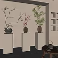 Three Decorative Vases With Bare Branches Red Blossoms Green Bamboo On White Pedestals Indoor Setting
