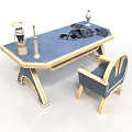 Blue And Gold Desk With Matching Chair And Elegant Design Featuring Lamp Candlestick And Books