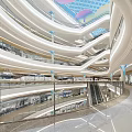 Modern Shopping Mall Interior With Curved White Ceilings Escalators And Retail Stores