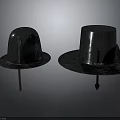 Two Shiny Metal Hat Shaped Household Items With Wide Brims On Dark Background