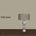 Modern Table Lamp With White Lampshade And Glass Column On Wooden Table