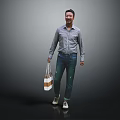 Man Wearing Striped Shirt And Jeans Holding Shopping Bag Smiling Against Gray Background Standing Naturally