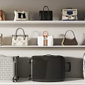 Stylish Handbags And Suitcases Displayed On White Shelves With Assorted Designs