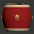 Red Musical Drum Featuring Golden Decorative Rings And Wooden Drumsticks On Surface