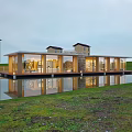 Modern Detached Villa With Waterfront Location Large Glass Windows And Scenic Reflections
