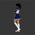 Young Woman In Blue And White Cheerleader Uniform Posing Against Gray Background