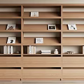 Modern Wooden Bookcase With Multi Layered Shelves Holding Books Photo Frames and Decorative Items