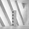 Modern Geometric Room Interior With Tall Speaker Towers And Concrete Walls Design