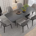 Contemporary Dining Table Set With Black Marble Top Six Gray Fabric Chairs And Green Plant