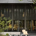 Natural Rockery Stones In Modern Outdoor Garden With Trees Grass And Lighting