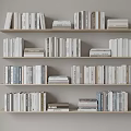 Various Books And Magazines Neatly Arranged On Multiple Wooden Bookshelves