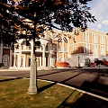 Elegant Classical Building with Red Bricks White Walls Porch Columns Autumn Trees Lawn and Bench