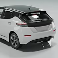 White Electric Hatchback With Black Roof Sleek Body And Modern LED Headlights