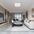 Modern Living Dining Room Interior Design With White Sofa Round Coffee Table And Decorative Paintings