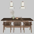 Wooden Dining Table Set with Rattan Chairs Pampas Grass Vase Under White Pendant Lights