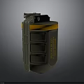 Green And Orange Hand Grenade With Cylindrical Body Pull Ring And Text Markings