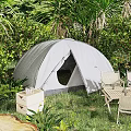 Gray Camping Tent In Lush Green Garden With Folding Chairs And Storage Box