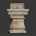 Ornate Stone Columns With Intricate Carved Floral Patterns And Lion Head Designs
