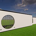 White Feature Wall with Circular Perforated Geometric Pattern Set Against Green Lawn and Blue Sky