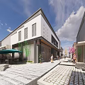 Modern Commercial Pedestrian Street With Traditional Architecture Outdoor Seating Greenery And Stone Paved Walkway
