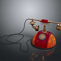 Vintage Electronic Telephone with Red and Gold Decorative Design and Old Fashioned Dial