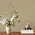White Vase with White and Green Flowers on Wooden Table Beige Wall Background