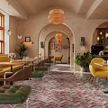 Café Interior Design With Arched Doorways Chandeliers Patterned Tiles Booth Seating And Colorful Chairs