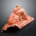 Red Wood Stone Model With Natural Rough Texture And Small Green Plants On Surface