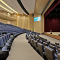 Modern Conference Room With Blue Seats Stage Large Screen And Wooden Walls