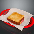 Toasted Sandwich With Golden Crust Served In Red Basket With White Paper