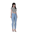 Woman in Gray Short Sleeve Top and Light Blue Jeans Standing Against Black Background