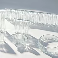 Transparent Glass Water Fountain With Striped Rectangular Curved Circular Structures And Shadow Effects